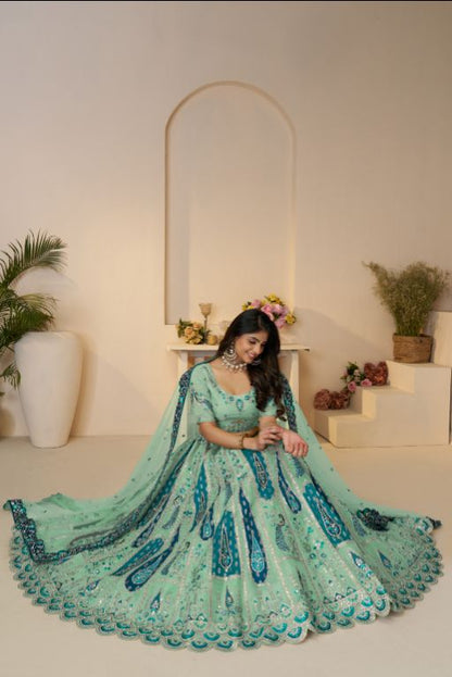 Royal Grandeur bridal sky blue  Lehenga with Paisley and Peacock Motifs & Heavy Embroidery