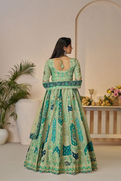 The Rajsi Haathi Collection: Graceful Reeen with peacock Embroidered bridal lehenga