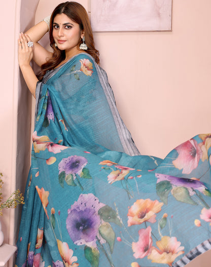 Blue soft linen cotton printed silk saree with woven border