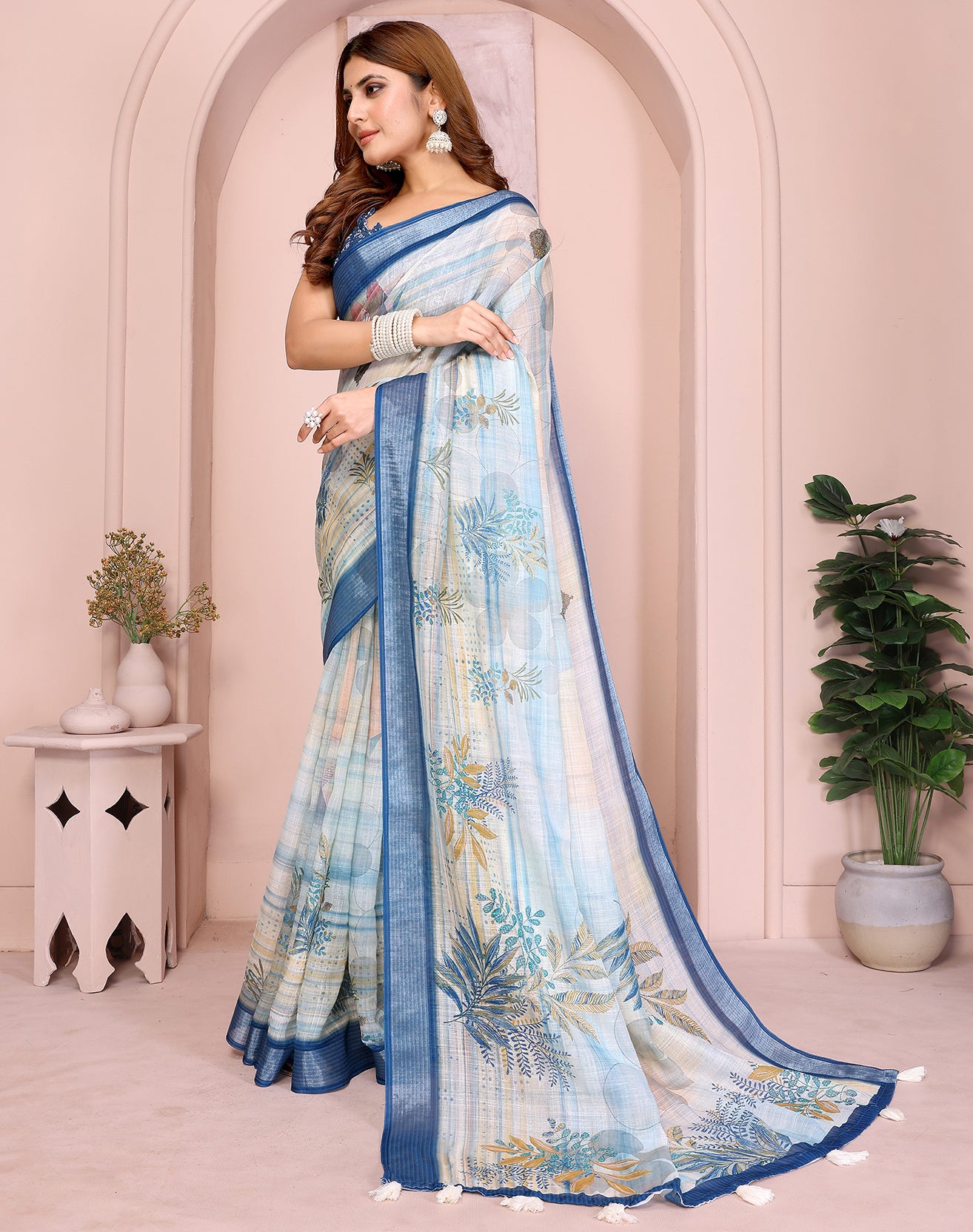 White soft linen cotton printed silk saree with woven border