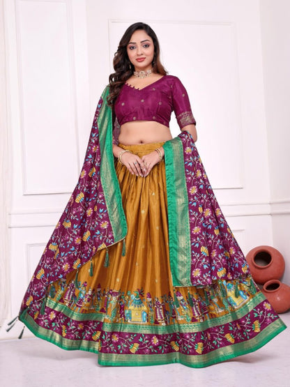 Mustard patola print dola silk semi stitched lehenga choli with tassels