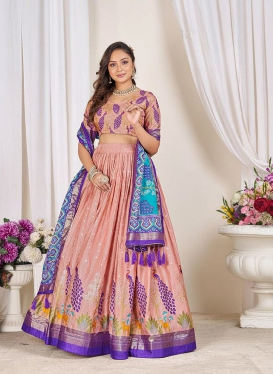 Pink patola print dola silk semi stitched lehenga choli with tassels