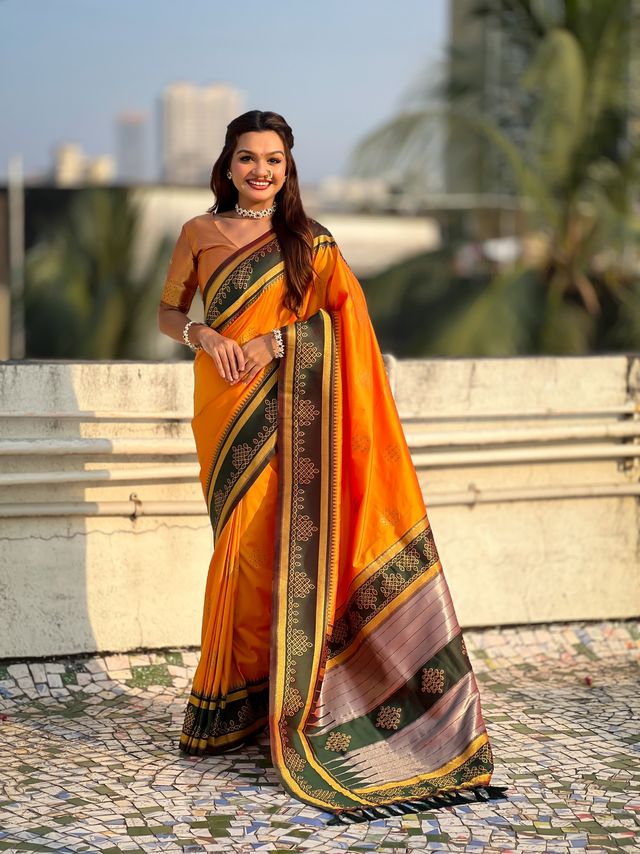 Orange Color Soft Silk Woven Designer Saree For Ceremonial Looks