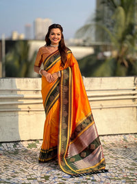 Orange Color Soft Silk Woven Designer Saree For Ceremonial Looks