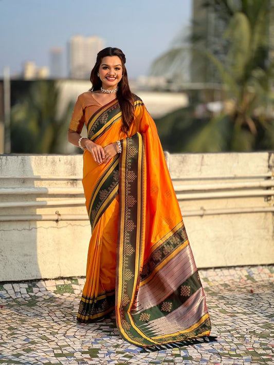 Orange Color Soft Silk Woven Designer Saree For Ceremonial Looks