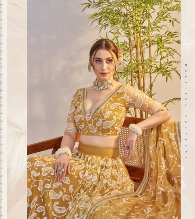 Mustard Yellow Heavy Embroidery Net Semi Stitch A Line Lehenga With Blouse