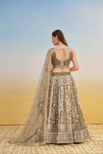 Ivory Heavy Embroidery Net Semi Stitch A Line Lehenga With Blouse