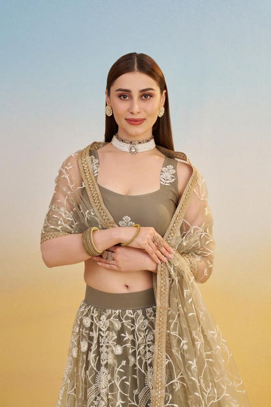 Ivory Heavy Embroidery Net Semi Stitch A Line Lehenga With Blouse