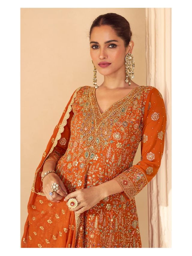Orange pure geogette full stitched suit Free Size upto 42