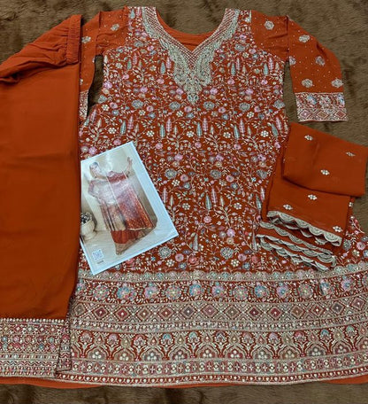 Orange pure geogette full stitched suit Free Size upto 42