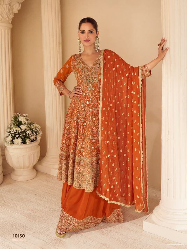 Orange pure geogette full stitched suit Free Size upto 42
