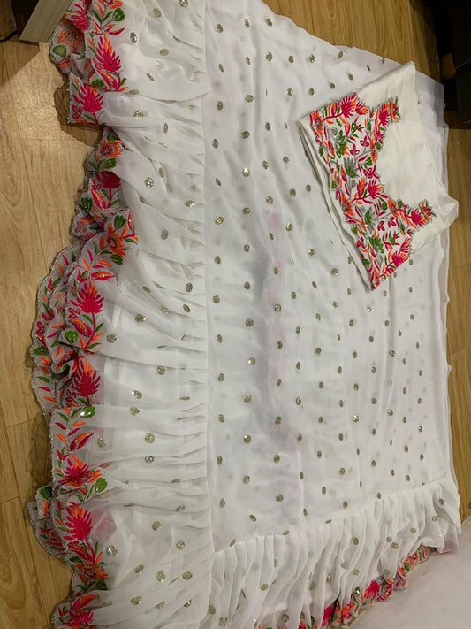 White Faux Georgette With Embroidered Sequence Work Ruffle Saree With Unstitched Blouse