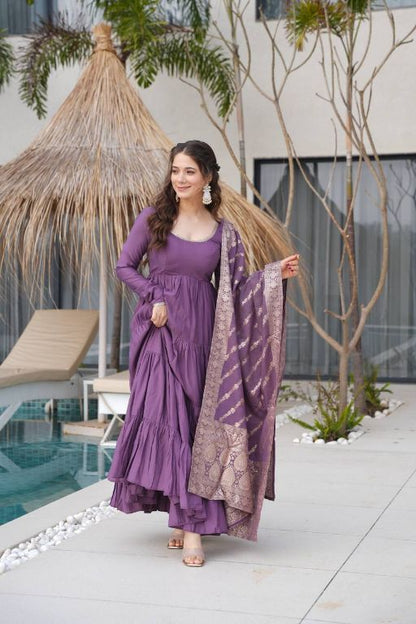 Anarkali Kurta Gown is a stunning traditional Indian outfit that combines elegance and style It is typically worn by women for special occasions