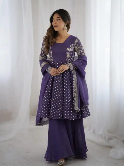 purple festive wear sharara suit for ladies with embroidery and flared sharara” “trending 2026 purple ethnic suit mirror work kurta sharara set for functions