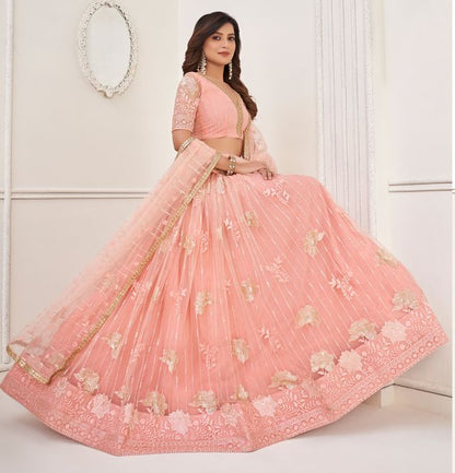 Peach Heavy Embroidery Net Semi Stitch A Line Lehenga With Blouse