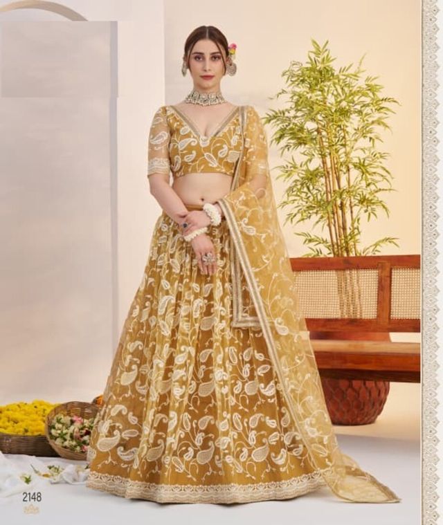 Mustard Yellow Heavy Embroidery Net Semi Stitch A Line Lehenga With Blouse