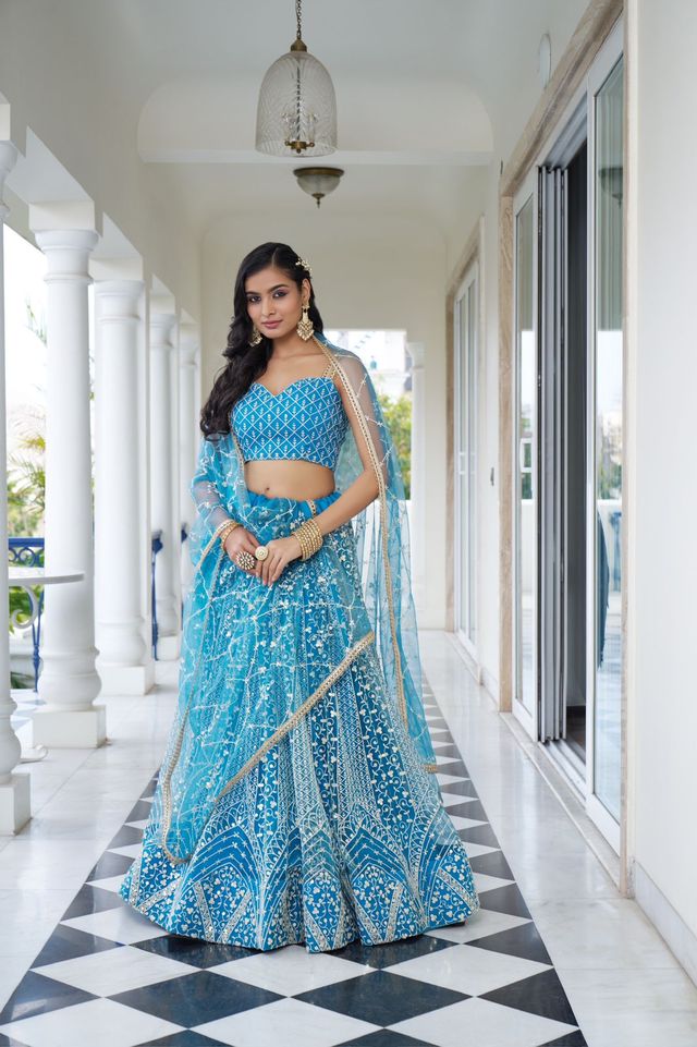 Light Blue Heavy Embroidery Net Semi Stitch A Line Lehenga With Blouse